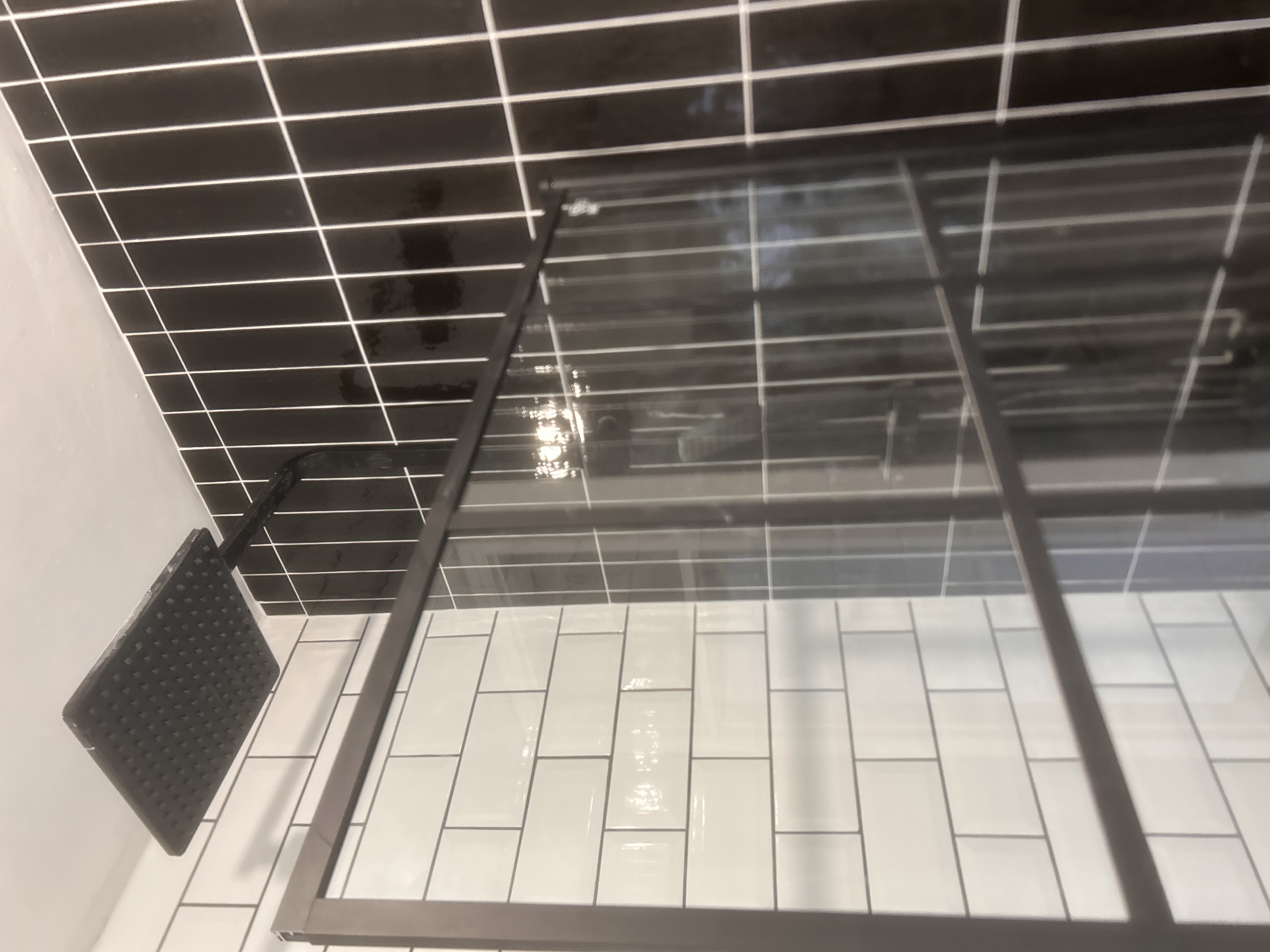 Walk-in shower enclosure